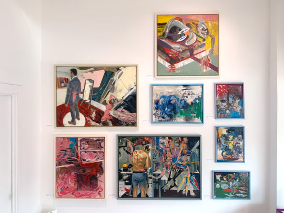 Eight paintings hang on a gallery wall. The style mixes tight renderings of figures with chaotic brush strokes and chaotic impasto.