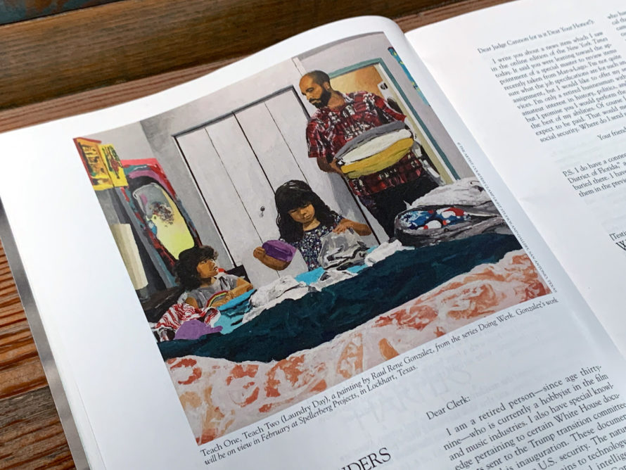 A magazine interior, showing a painting of a father folding laundry with his daughters